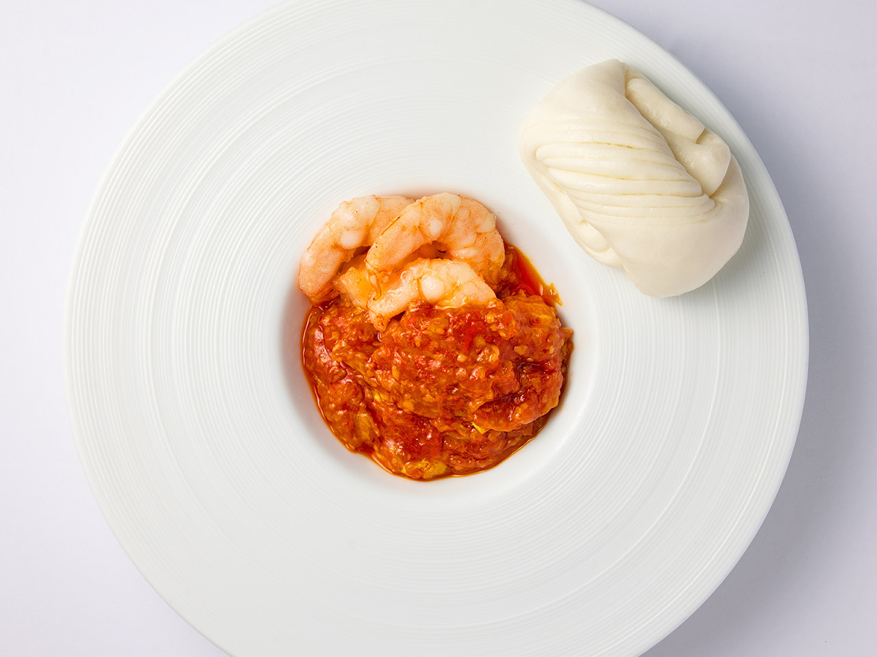 外苑前『礼華 青鸞居』の「海老のチリソース煮込み 花巻添え」