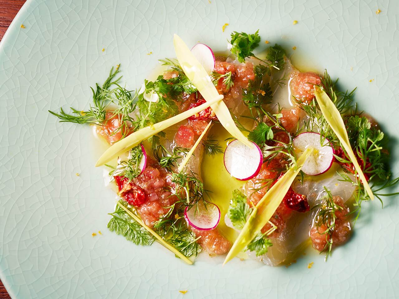 白金高輪『ristorante io』の「真鯛のカルパッチョ」